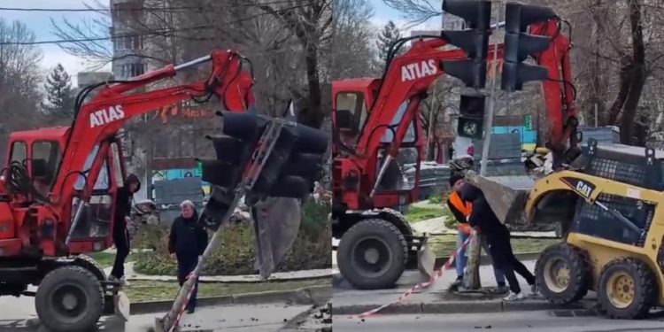 Câțiva bărbați au „smuls din pământ” un semafor la Botanica. Au „reanimat” rapid situația, cu un buldozer