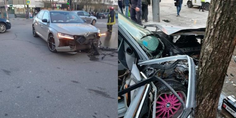 Momentul în care șoferul BMW-ului ce s-a lovit violent cu o Skoda, apoi s-a izbit în copac este scos dintre fiare de salvatori