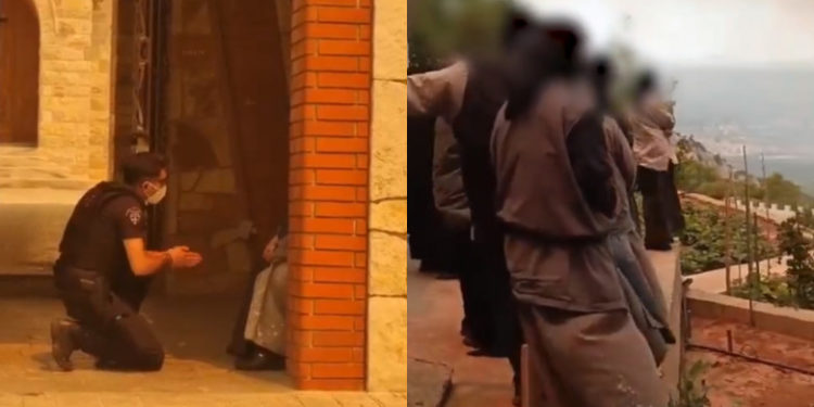 Scene dramatice din Grecia: Un polițist se roagă în genunchi de călugărițe să evacueze mănăstirea amenințată de incendii