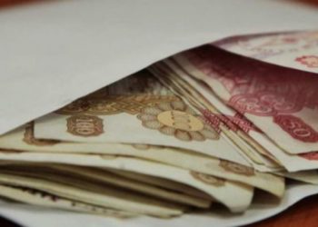 Economia tenebră sufocă Moldova. Aproape 200 mii de persoane au primit salariile în plic, anul trecut