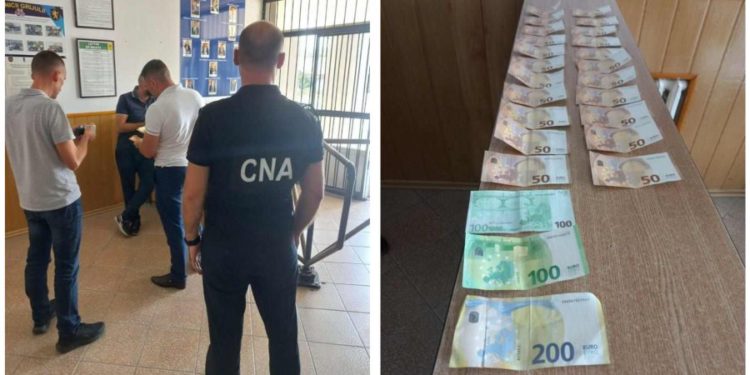 Un polițist din Edineț – reținut în flagrant de CNA. Câți bani a primit pentru mușamalizarea unui caz