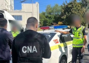 Doi polițiști de patrulare, reținuți de CNA: Aceștia ar fi fost mituiți de un șofer beat